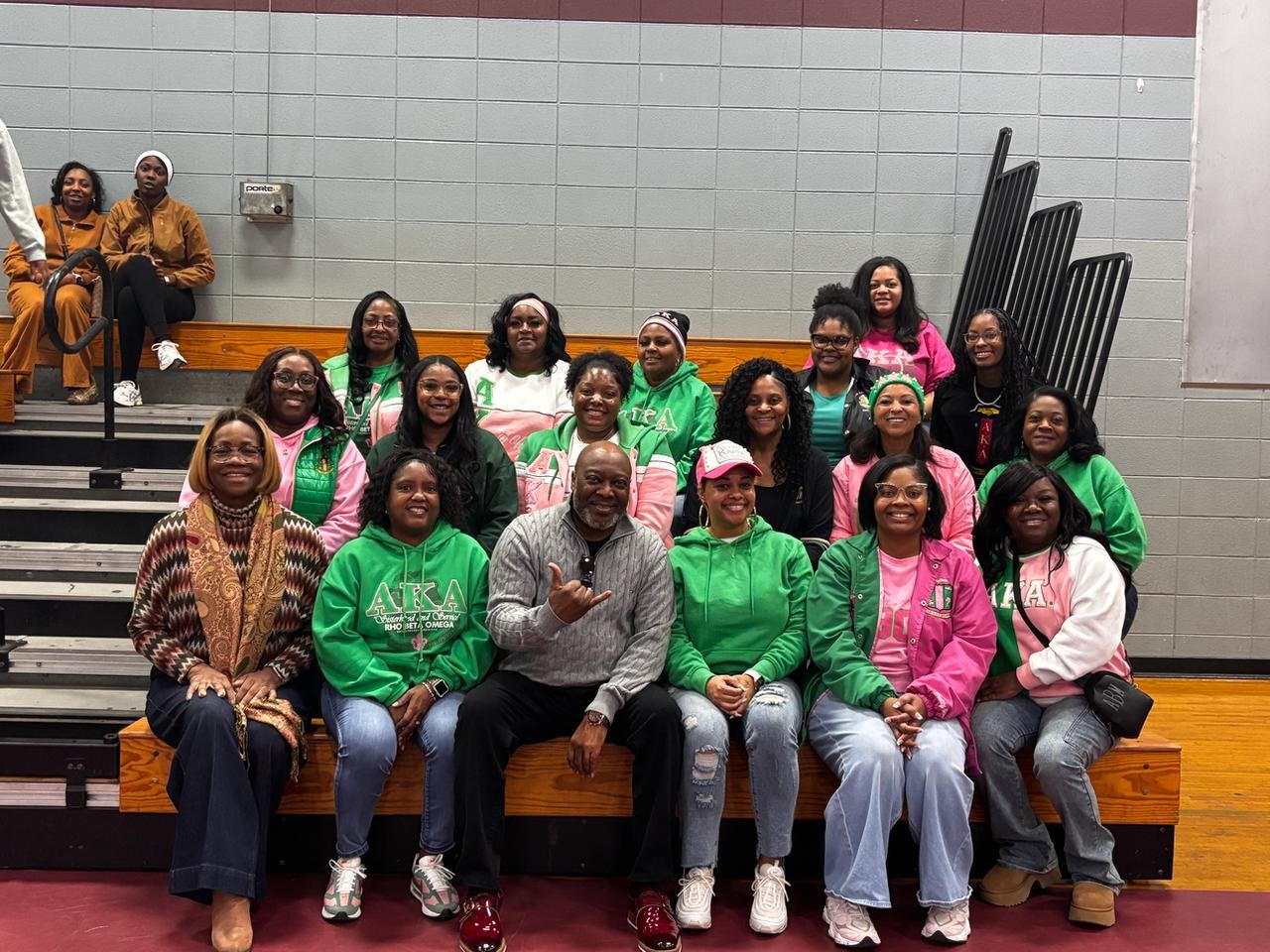 Cloyd Benjamin with AKA community members