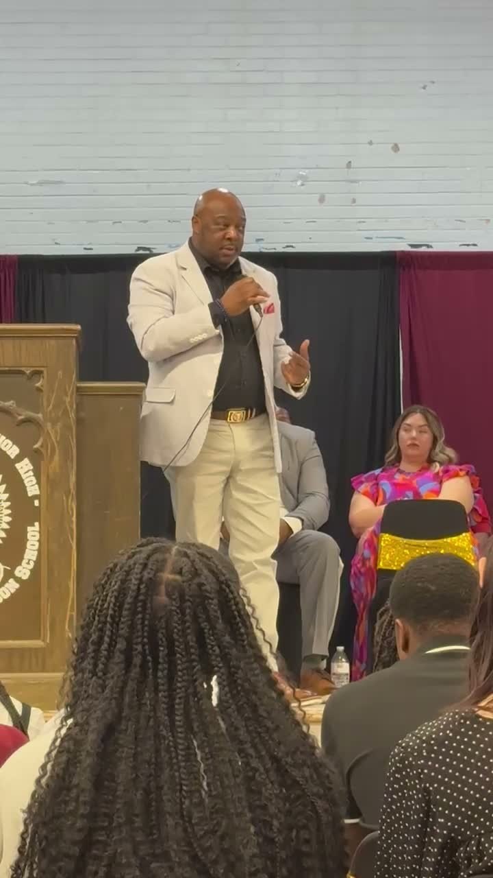 Cloyd Benjamin with community members