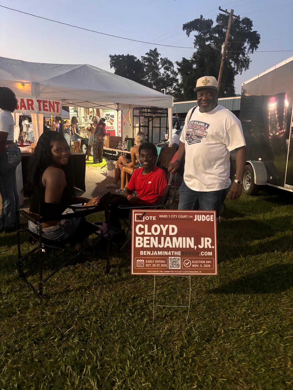 Cloyd Benjamin meeting voters at a community campaign event