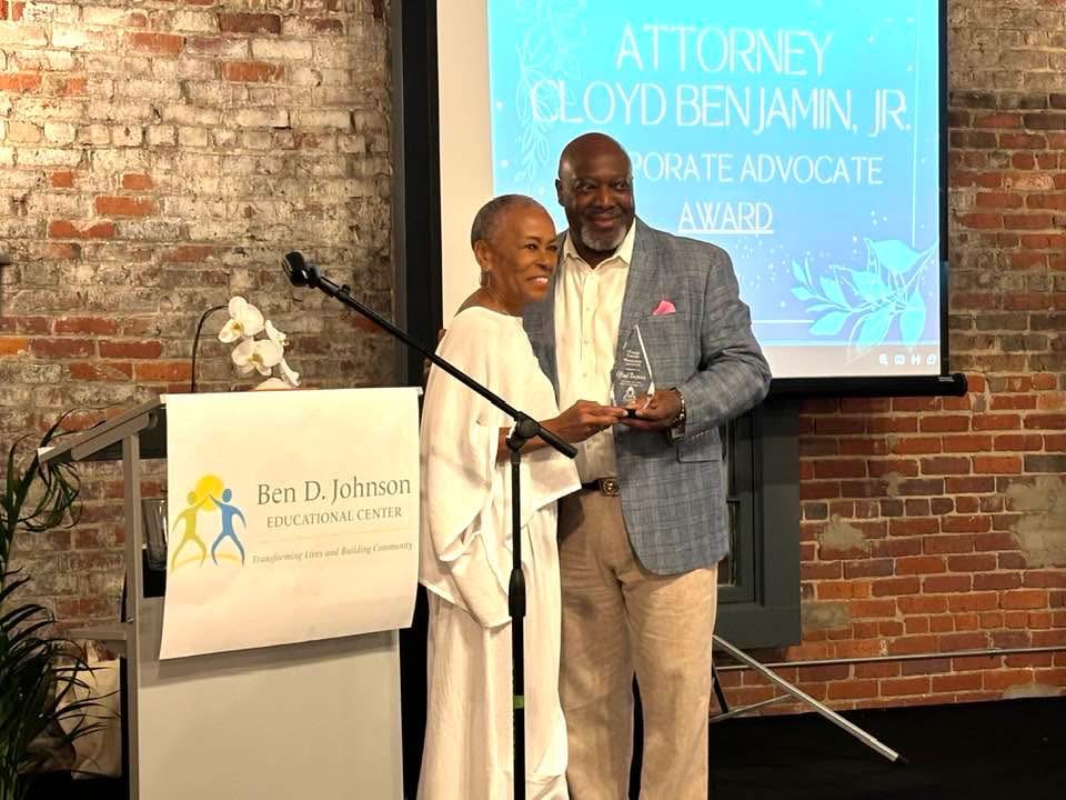 Cloyd Benjamin receiving the Corporate Advocate Award at the Ben D. Johnson Educational Center