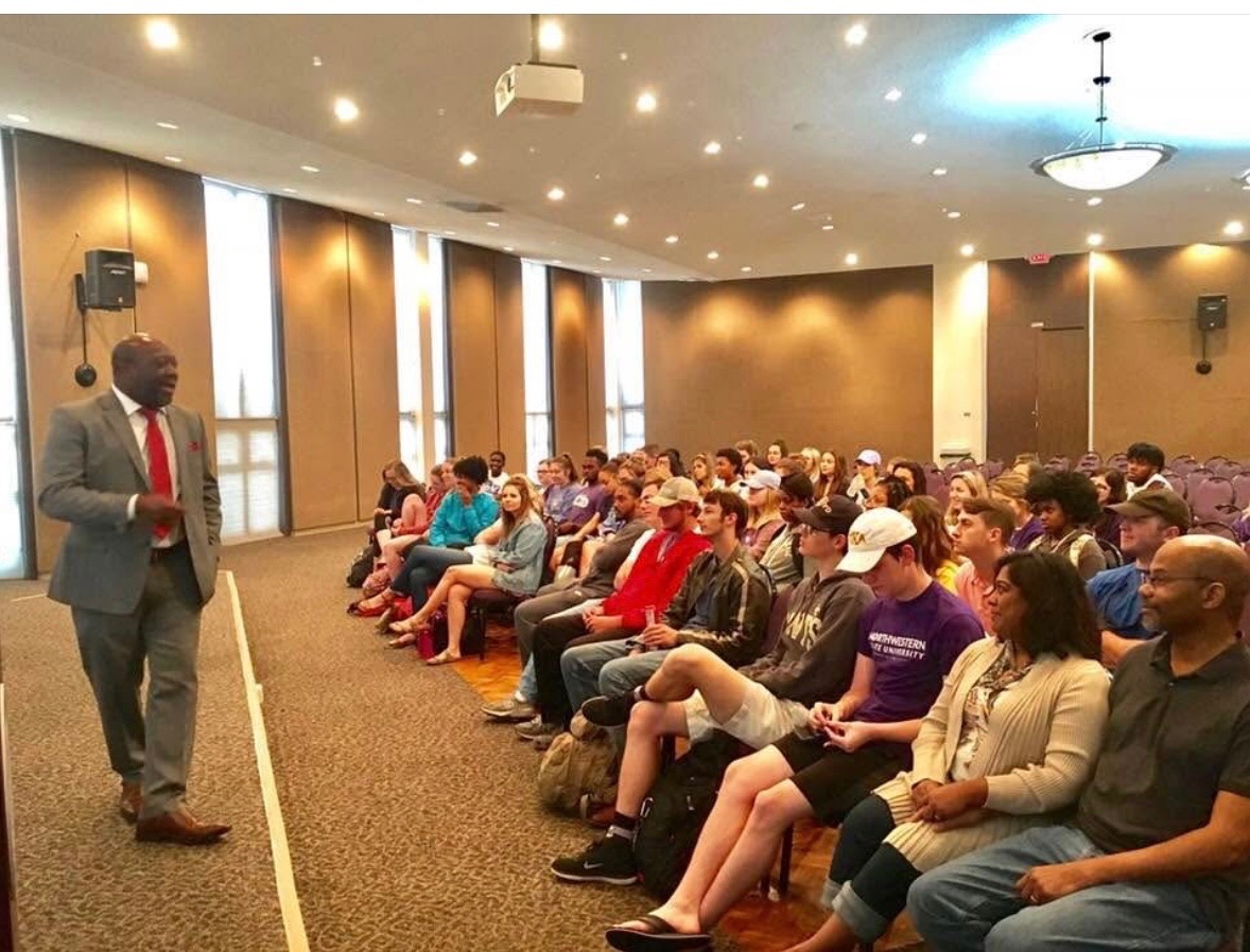 Cloyd Benjamin speaking to NSU Greek organization students concerning safety during pledge periods